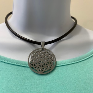 FLOWER of LIFE Stainless Steel   Necklace, 4mm Genuine Leather  Cord and 14 inches long plus 2 inches extended chain.