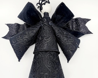 Ángel festivo de brocado negro