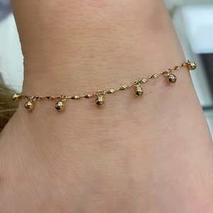 14k Dainty Gold Beaded Bracelet. Dangling Gold Bead Bracelet. Stackable Bracelet.