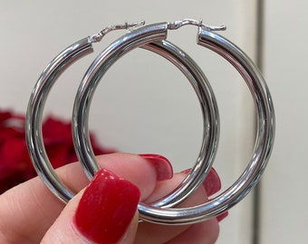 14k white gold hoop earrings. 2 inch long white gold hoop earrings. Fancy 4mm hoops. Genuine gold hoops.