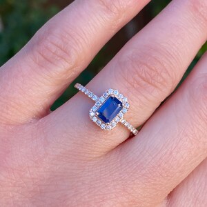 Emerald cut sapphire sales halo ring