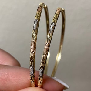 14k Tri-Color Hoop Earrings. 2.25 Inch Tri-Color Hoops. Yellow Gold White Gold Rose Gold Diamond Cut Heart Design.