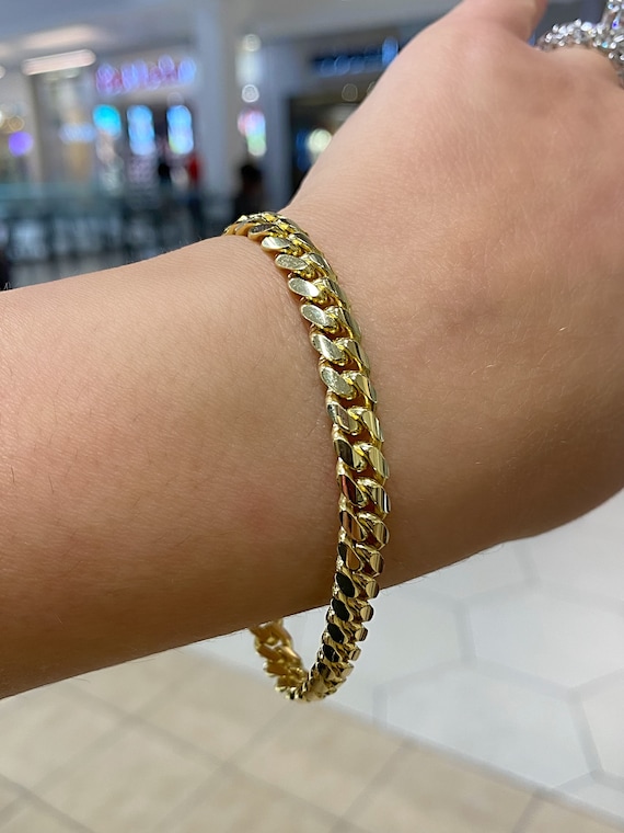 monogram chain bracelet gold