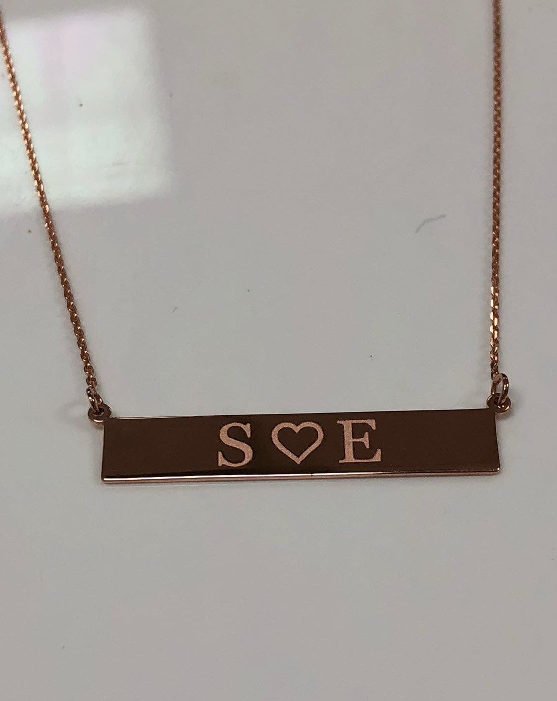 Rose gold name plate deals necklace