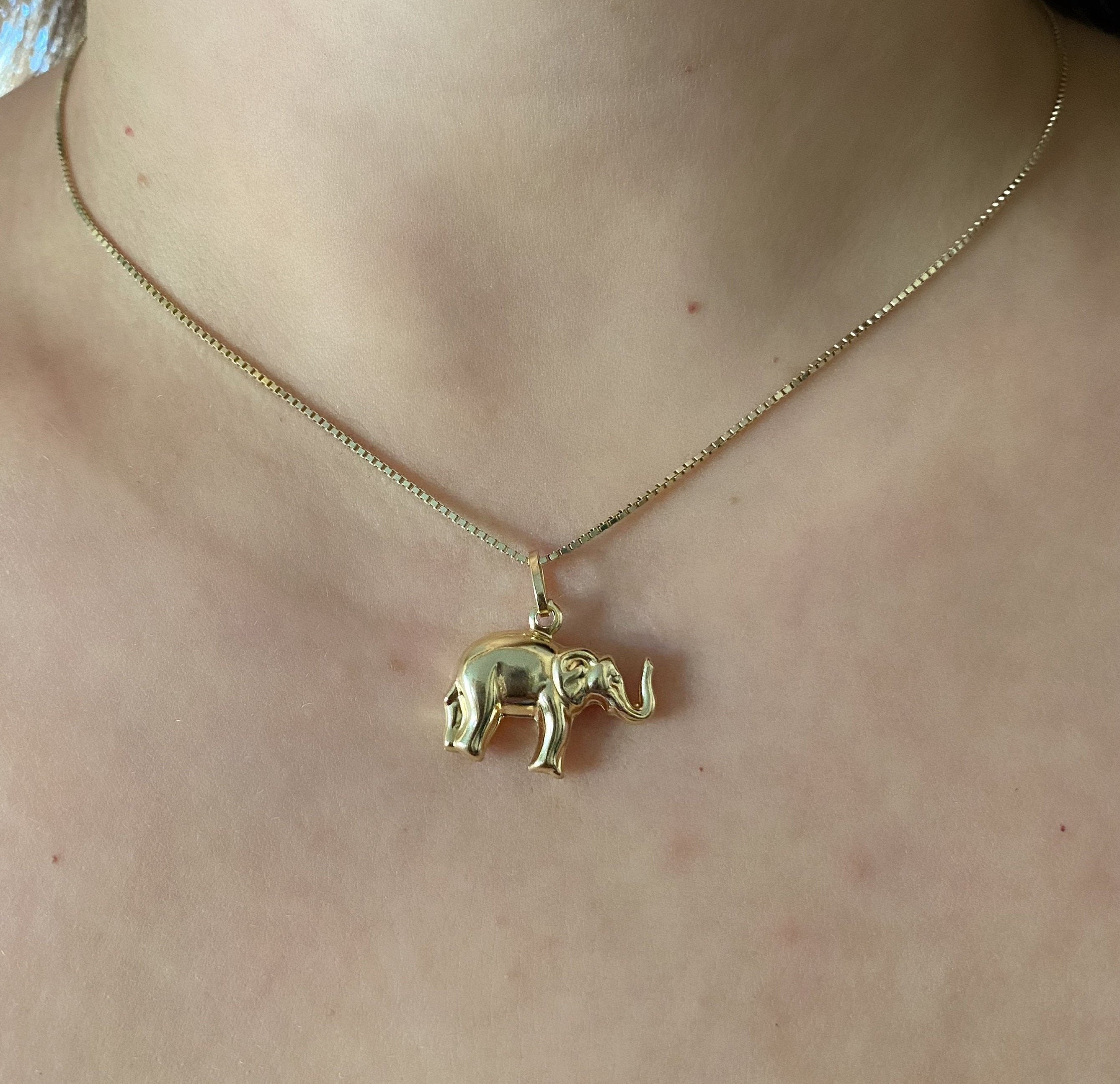 Solid gold shop elephant pendant