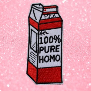 May include: A white carton with red and black details, resembling a milk carton. The carton has the text "100% PURE HOMO" printed on it.