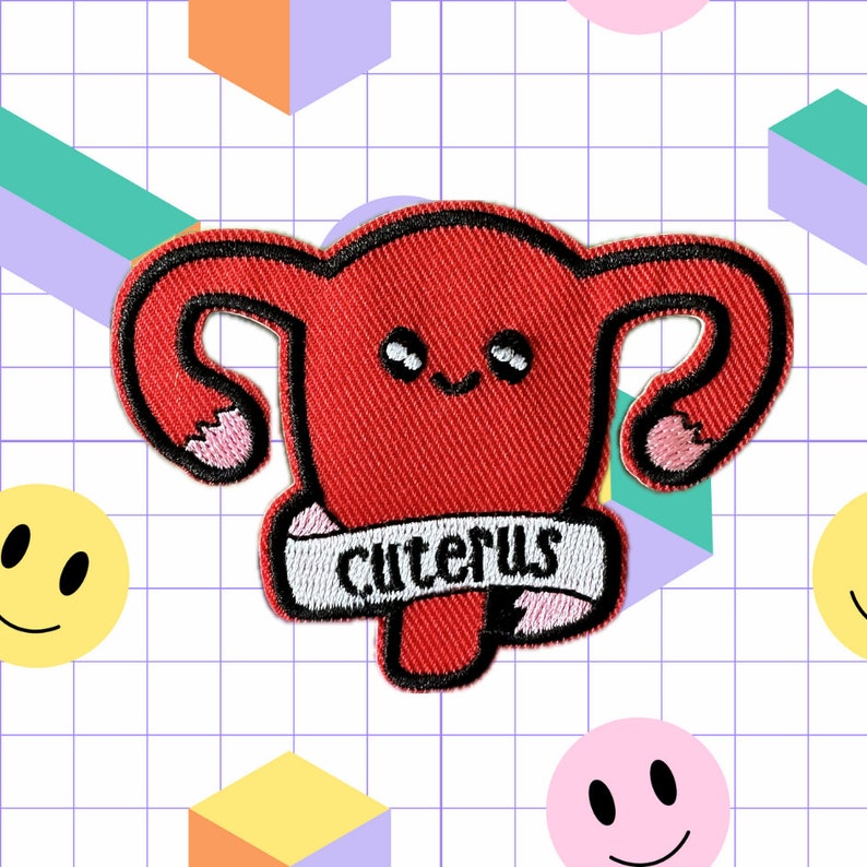 May include: Red felt patch with a cartoon uterus with a smiling face and the word "uterus" written on a white banner.