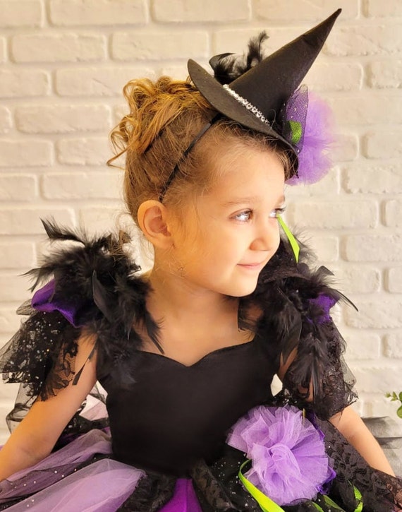 Costume Strega nera bambina per Halloween e seminare paura