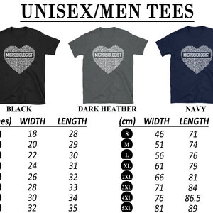 May include: A unisex t-shirt with a heart-shaped design featuring the word "MICROBIOLOGIST" in white text. The shirt is available in black, dark heather, and navy. The size chart shows measurements in inches and centimetres for both width and length.