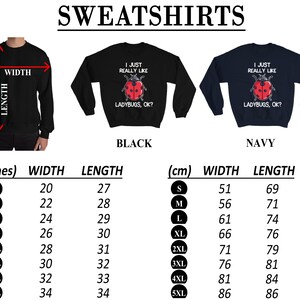 May include: Black and navy blue sweatshirts with a ladybug graphic and the text "I just really like ladybugs, ok?" Size chart in inches and centimeters.
