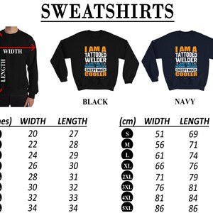 May include: A size chart for a black and navy blue sweatshirt with the text "I am a tattooed welder, just like a normal welder except much cooler". The chart shows the width and length measurements in inches and centimeters for sizes S through 5XL.