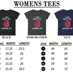 May include: Three women's t-shirts with a ladybug graphic and the text "I just really like ladybugs, ok?" The shirts are available in black, dark heather, and navy. The size chart shows the width and length in inches and centimeters.