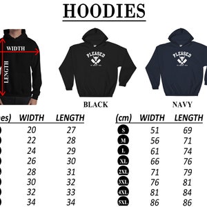 May include: A size chart for hoodies in black and navy blue. The chart shows the width and length measurements in inches and centimeters for sizes S through 5XL.