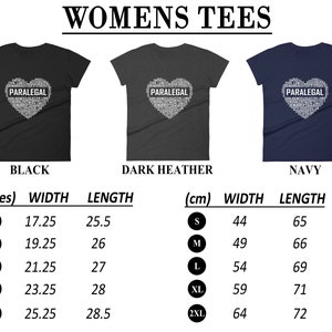 May include: A women's t-shirt featuring a heart-shaped design made up of the word "PARALEGAL" in white text. The shirt is available in black, dark heather, and navy. The size chart shows measurements in inches and centimetres.