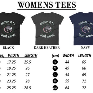 May include: A women's t-shirt with a graphic of an opossum and the text "Opossum is my spirit animal". The shirt is available in black, dark heather, and navy. The size chart shows the width and length of the shirt in inches and centimeters.
