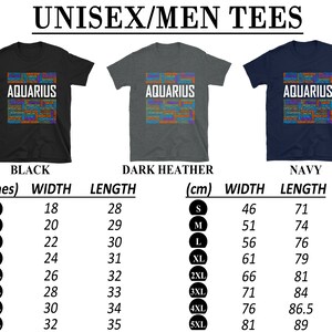 May include: A size chart for unisex t-shirts in black, dark heather grey, and navy blue. The chart shows the width and length measurements in inches and centimeters for sizes S through 5XL. The t-shirts feature a graphic design with the word "Aquarius" in colorful text.