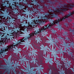 Fuchsia Brocade Satin Fabric With Blue Leaves Print Fabric by meter