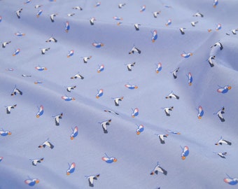 May include: A light blue fabric with a repeating pattern of white birds flying in a diagonal direction. The fabric has a subtle sheen and a smooth texture.