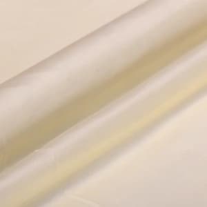 May include: A close-up of a smooth, off-white fabric with a subtle sheen. The fabric is folded in half, creating a soft, flowing drape.