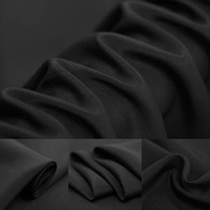 Pode incluir: Tecido preto com uma textura lisa e sedosa. O tecido é drapeado e dobrado para mostrar sua natureza fluida.