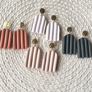 Timeline arched dangle earrings