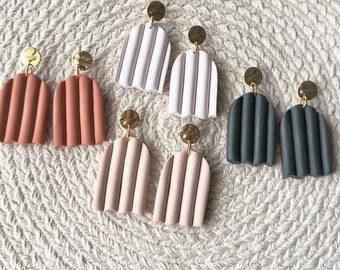 Timeline arched dangle earrings