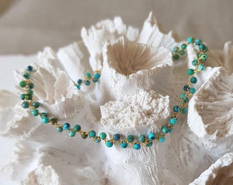 Gold filled chain bracelet with woven gemstones