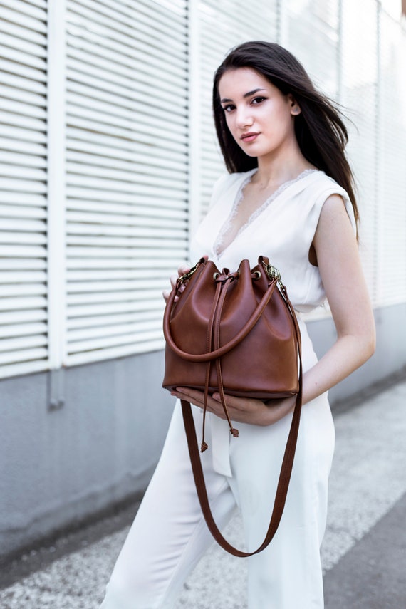 Leather crossbody bucket bag deals