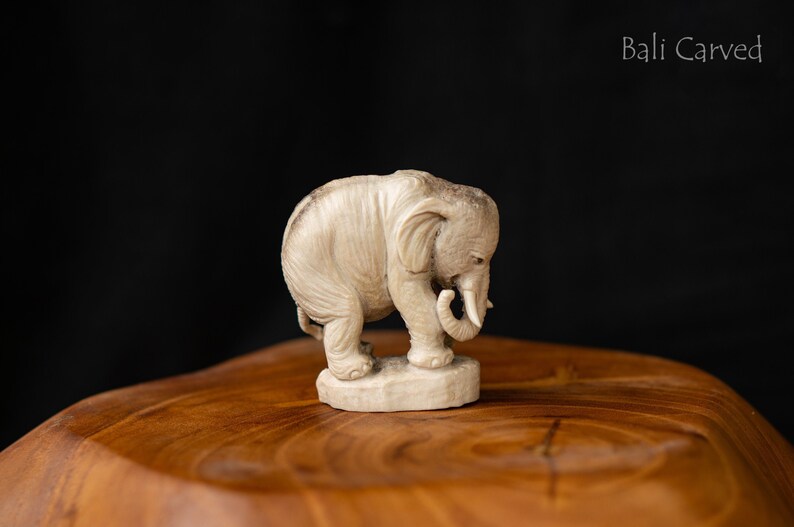 Carved white elephant figurine of deer antler Miniature elephant carving Elephant statue as animal lover gift