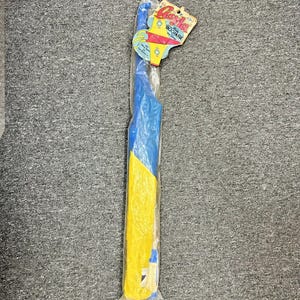 May include: A blue and yellow plastic toy boomerang in a clear plastic bag with a red, white, and blue label that says "Gayla Boomer" in a white font.