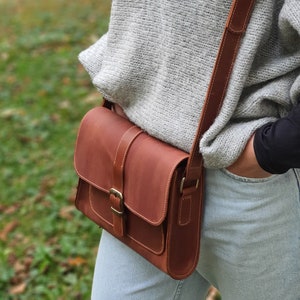 small light brown leather shoulder bag for travelling