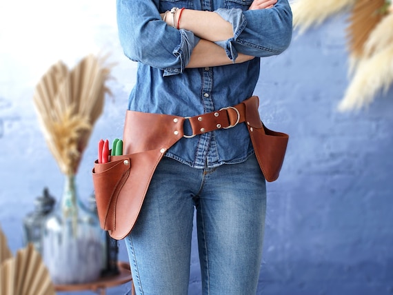 Left handed tool clearance belt