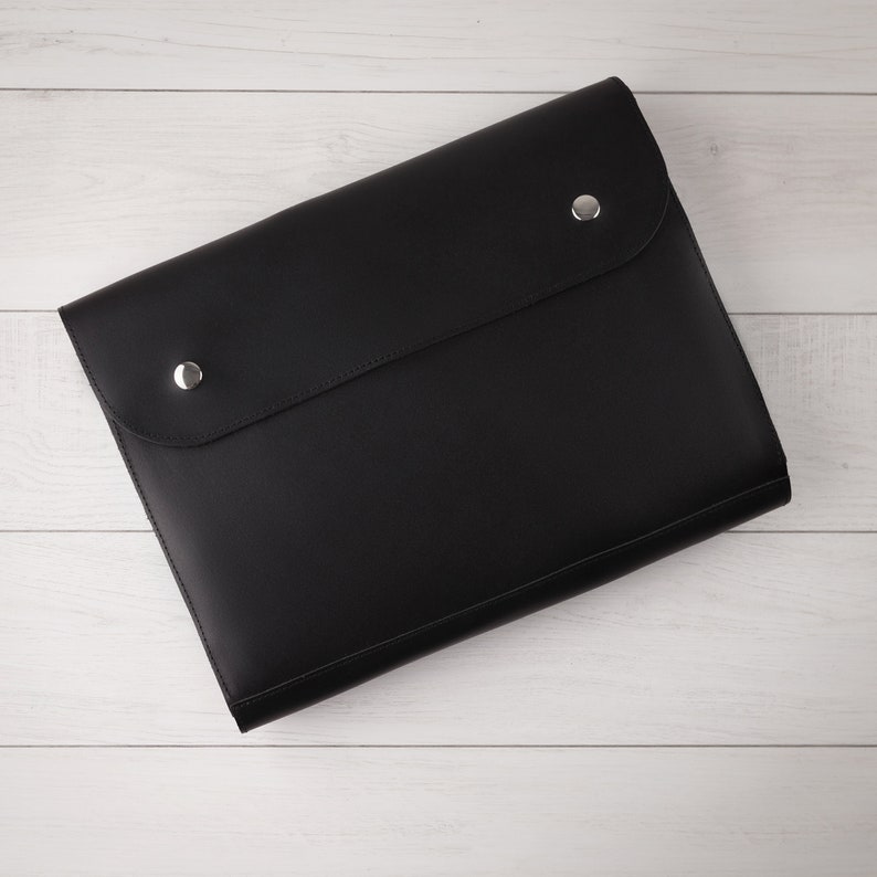 Black leather file folder with buttons