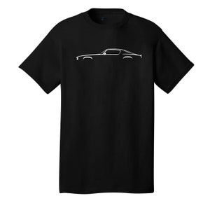 May include: Black t-shirt with a white silhouette of a classic car.