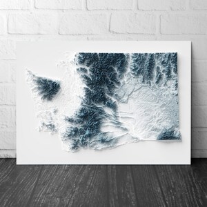 May include: A topographic map of the state of Washington, showing the elevation of the land in shades of blue and white.