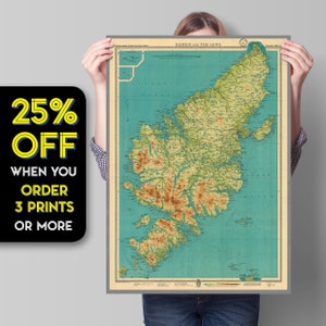 May include: A vintage map of Harris and the Lews, Scotland, with a green and blue color scheme. The map is framed and being held by a person. The text "HARRIS AND THE LEWS" is visible at the top of the map. A sale banner reads "25% OFF WHEN YOU ORDER 3 PRINTS OR MORE".