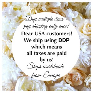 May include: A circular white sign with black text reading: Buy multiple items - pay shipping only once! Dear USA customers! We ship using DDP which means all taxes are paid by us! Ships worldwide from Europe. The sign is surrounded by cream flowers.