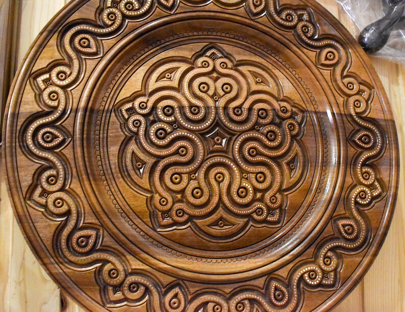 A plate with a unique design Carved handmade plate a gift for a housewarming Ukrainian style of artistic carving gift for a wedding
