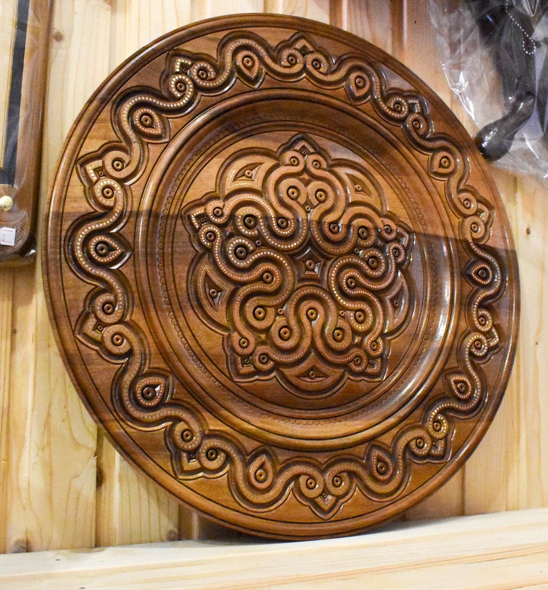 A plate with a unique design Carved handmade plate a gift for a housewarming Ukrainian style of artistic carving gift for a wedding