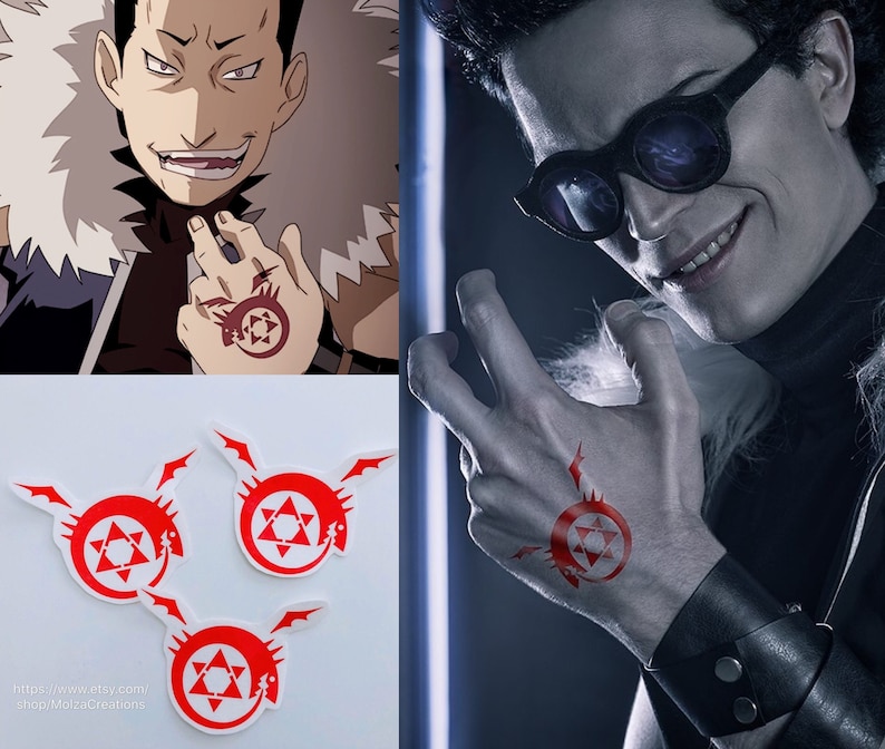 May include: Three red and white temporary tattoos of the symbol from the anime Fullmetal Alchemist. The symbol is a circle with a star inside and a snake wrapped around it.