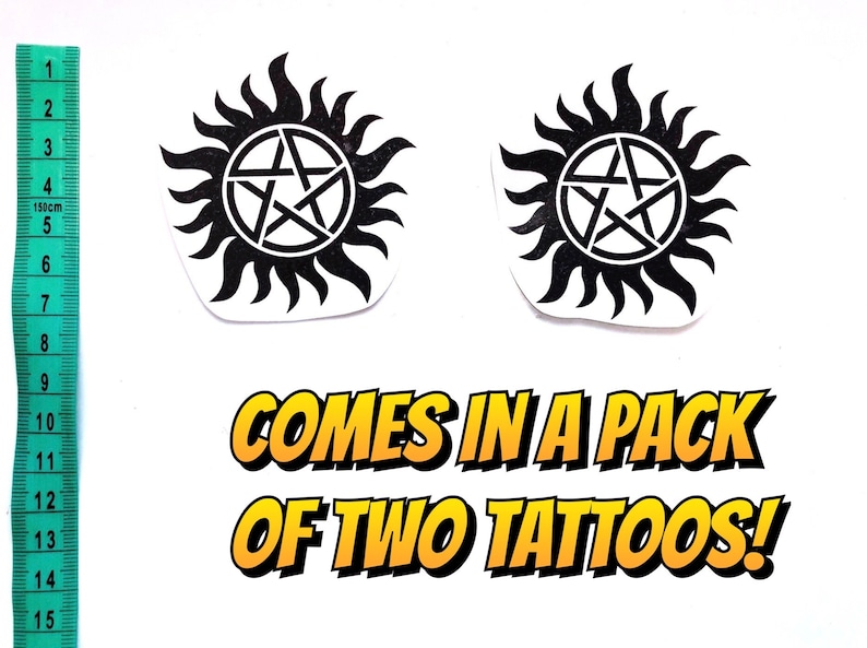 May include: Two black and white temporary tattoos of a pentagram inside a circle with sun rays. The tattoos are on a white background. The text "COMES IN A PACK OF TWO TATTOOS!" is below the tattoos.