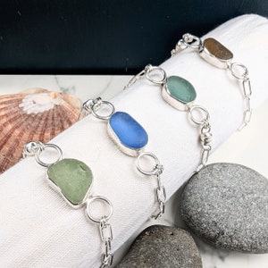 Sea glass bracelet. Sea glass bangle. Handmade in sterling silver. Paperclip chain bracelet. Blue sea glass jewellery.