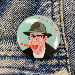 Ned the Head Button