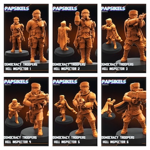 Op de afbeelding: Een verzameling van zes oranje miniatuurbeeldjes van "Democracy Troopers Hell Inspector" personages. Elke figuur poseert anders, sommige houden wapens vast. De merknaam "Papsikels" staat bovenaan elke afbeelding, met de naam van het personage eronder.