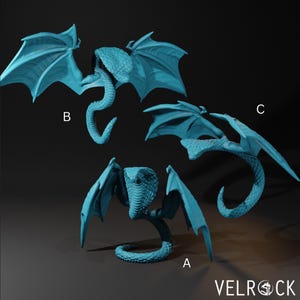 May include: Three blue cobra dragon sculptures with outstretched wings are shown against a dark background. Each sculpture has a detailed, textured body and wings. The sculptures are labelled A, B, and C. The Velrock logo is visible in the bottom right corner.