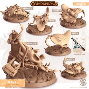 May include: A set of 3D printed miniature figurines of a stingray, with different poses and accessories. The stingray is a fantasy creature with a large, flat body and a long, whip-like tail. The figurines are painted in a light brown color and are ready to be used in tabletop games or as decorative pieces.