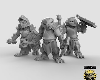 May include: Three gray, plastic, miniature figures of fantasy creatures wearing armor and holding weapons. The figures are posed in a fighting stance. The figures are part of a tabletop game.
