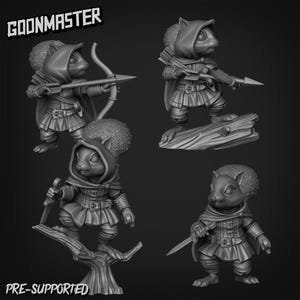 May include: Four gray 3D printed miniature figures of squirrels wearing hooded cloaks and holding weapons. The figures are posed in various action poses. The text "GOONMASTER" is in the upper left corner of the image. The text "PRE-SUPPORTED" is in the lower left corner of the image.