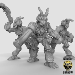 May include: Three grey, detailed, plastic figurines of humanoid creatures with insect-like features. The figures are posed in a dynamic action stance, with one holding a weapon.