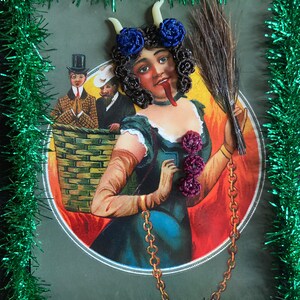 Reproduction Victorian “Lady Krampus” print decorated with Victorian inspired human hair work.